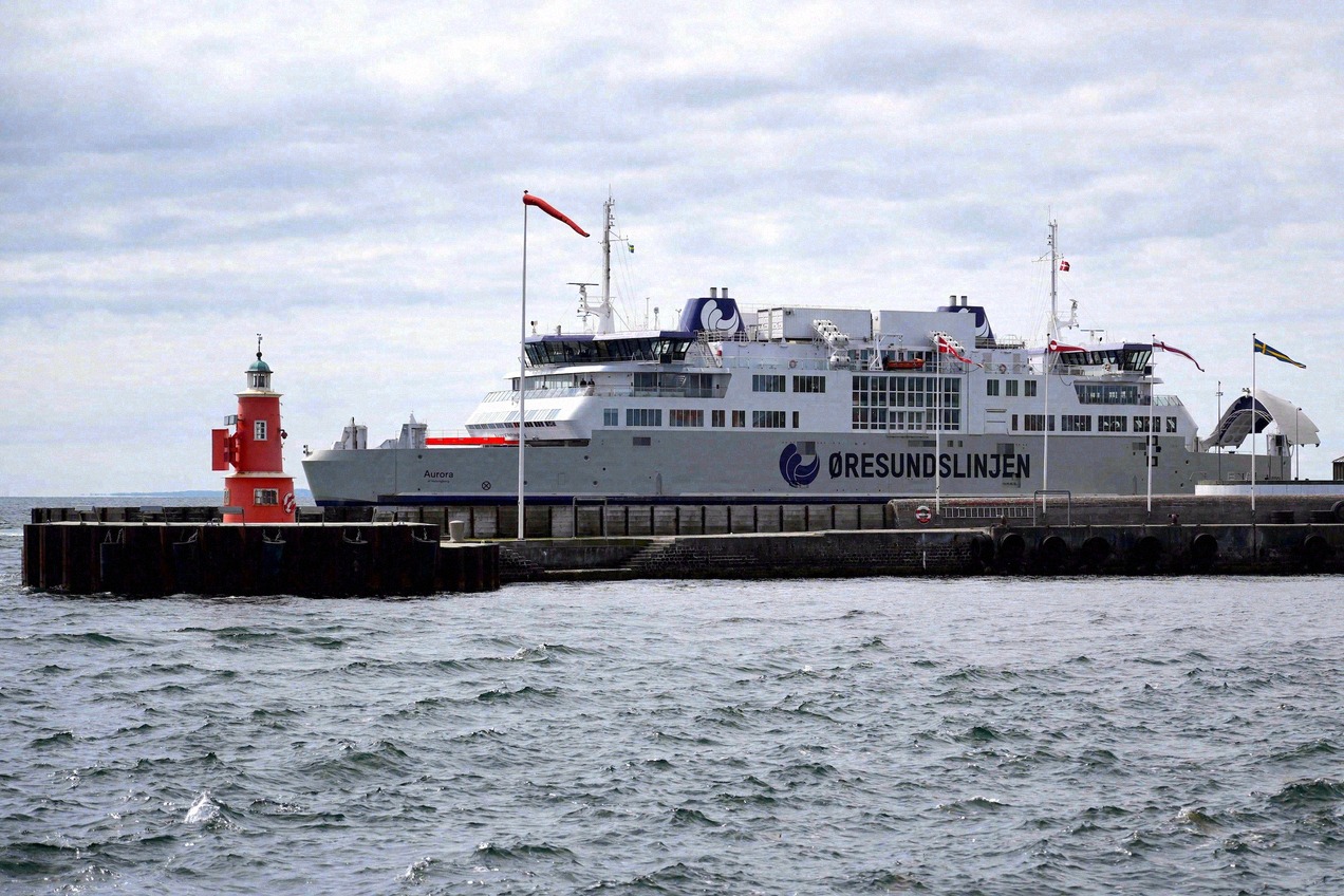 Öresundslinjen ferry crossing the Öresund between Helsingør and Helsingborg in sunshine, with a view of the Swedish coast